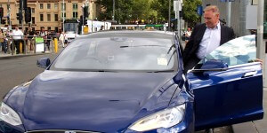 CEO Ron Gauci getting into the Tesla