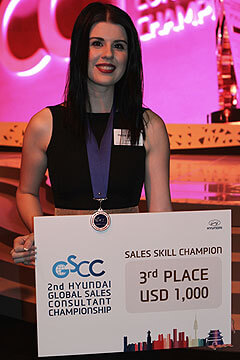 That winning feeling: Australian Hyundai consultant Melissa O'Kearney with her third place award at the Global Sales Consultant Championship.